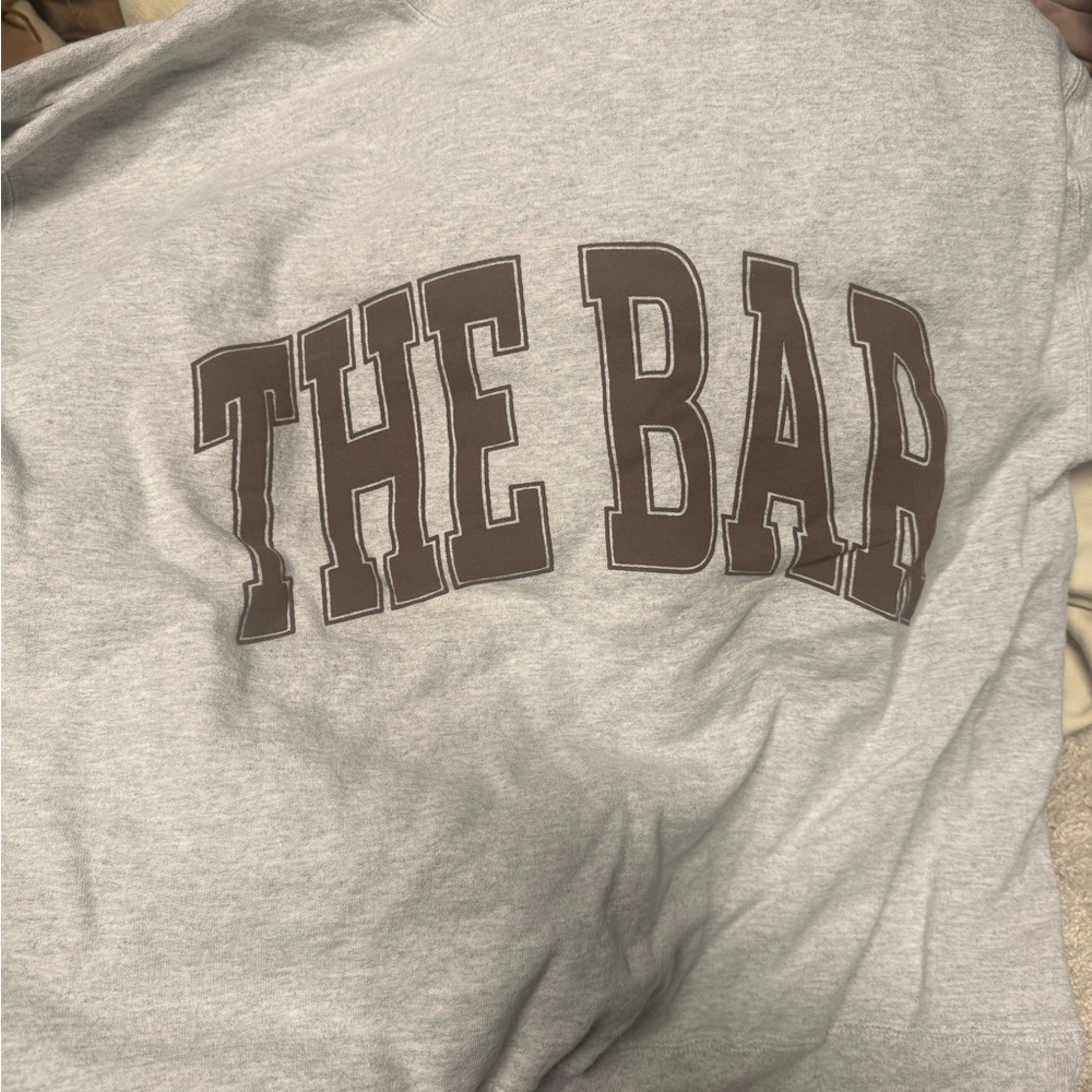 The Bar Gray Sweatshirt with Brown Lettering